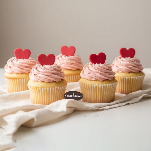 Red Heart Cupcake – vanilla or chocolate cupcake with cream frosting and red heart by Cakes and Bakes Bakery Dubai.