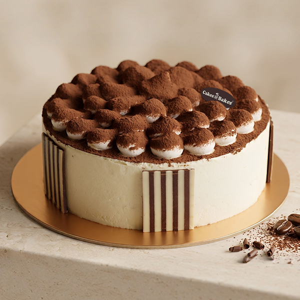Classic Italian Tiramisu from Cakes and Bakes Bakery Dubai, a creamy coffee and cocoa-flavored Italian dessert for celebrations and coffee lovers.