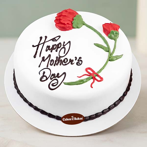 Red Floral Mother Day Cake with white frosting by Cakes and Bakes Dubai